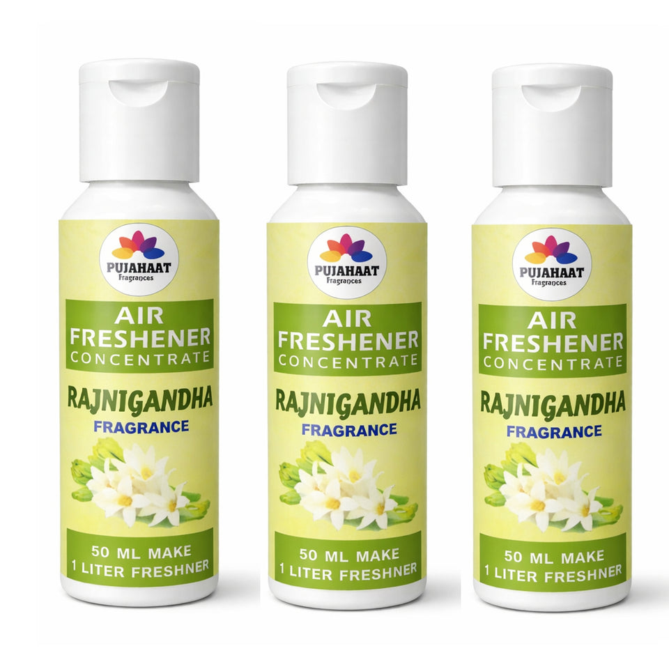 Three bottles of Pujahaat Air Freshener Concentrate with Rajnigandha fragrance on a white background.