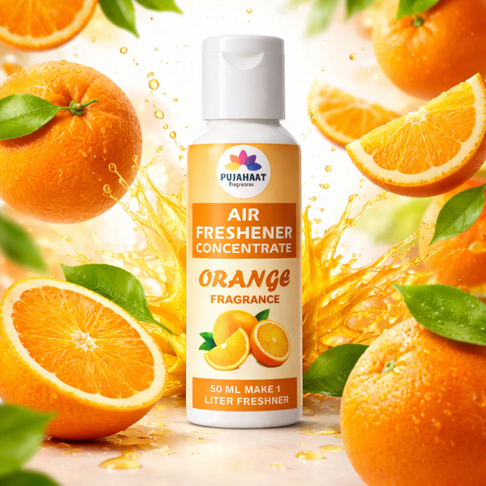 Air freshener concentrate bottle with orange fragrance surrounded by oranges and orange slices.