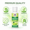 Air freshener concentrate bottle with green apple fragrance on a white background
